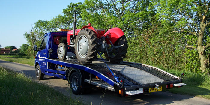 Massey Ferguson tractor on Stuart Wright Transport's transporter